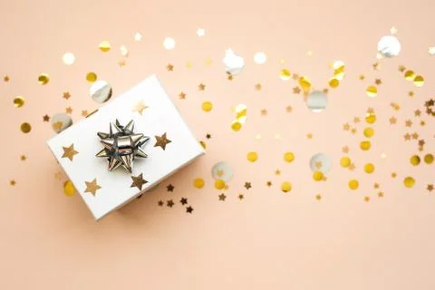 Gift box on a pink background Stock Photos