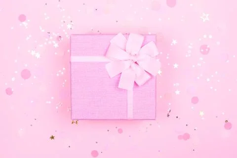 Gift box on pink backround Stock Photos