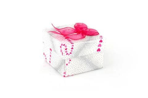 Gift box with pink bow Stock Photos
