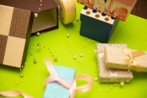 Gift box preparation, workflow. on a green background, Happy valentines day, Stock Photos