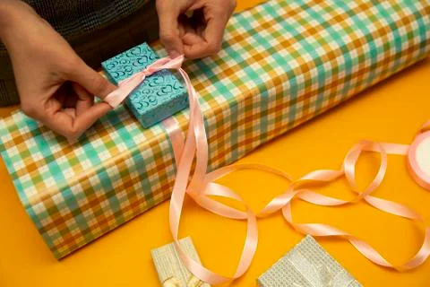 Gift box preparation, workflow. on a yellow  background, Happy valentines day Stock Photos