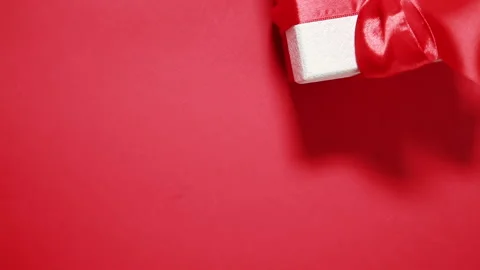 Gift box on red background 스톡 동영상 139705339