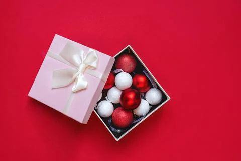 Gift box on red background Stock Photos