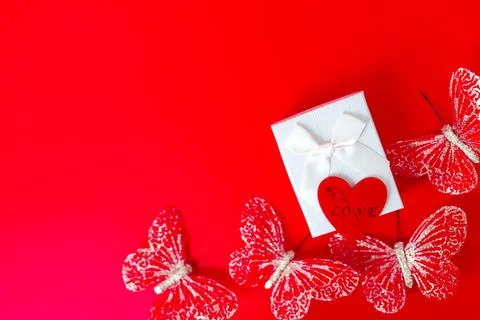 Gift box on red background. Romantic st. Valentine's day concept of greetings Stock Photos