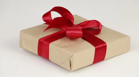 Gift box with a red bow Stock Footage 58537957
