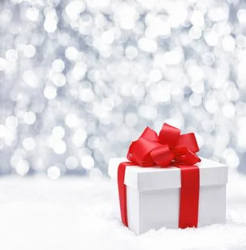 Gift box with red bow Stock Photos