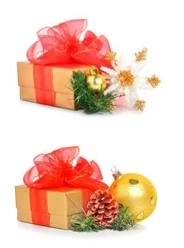 Gift box with red mesh bow and christmas baubles Stock Photos