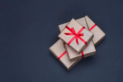 Gift box with red ribbon Stock Photos