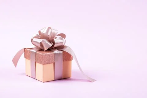 Gift box with ribbon bow Stock Photos