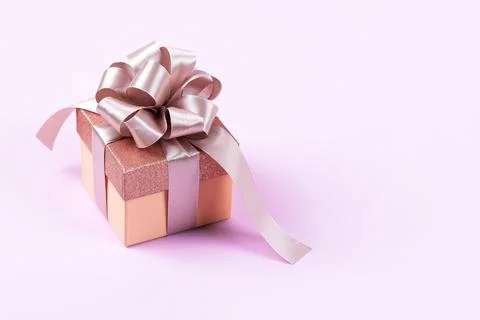 Gift box with ribbon bow Stock Photos