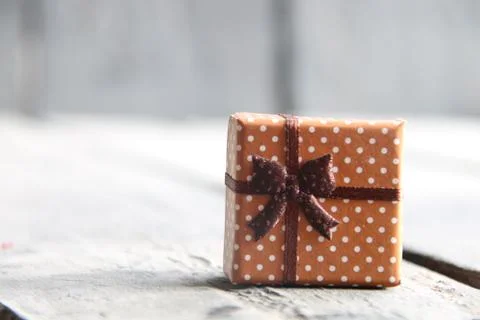 Gift box with ribbon Stock Photos