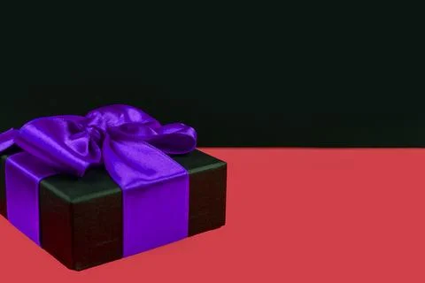 Gift box with ribbon Stock Photos