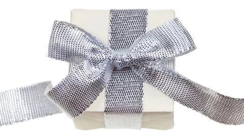 Gift box with silver bow Stock Photos
