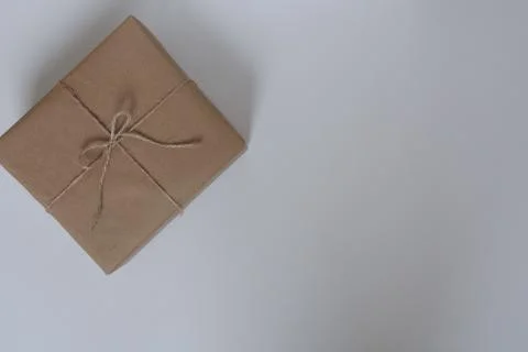 Gift in a box on a white background with place for text Stock Photos