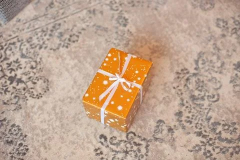 Gift box on white background. Present in craft and colored paper decorated with Stock Photos