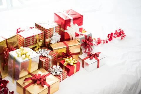 Gift box on white bed sheet background for surprise Children in New year or.. Stock Photos