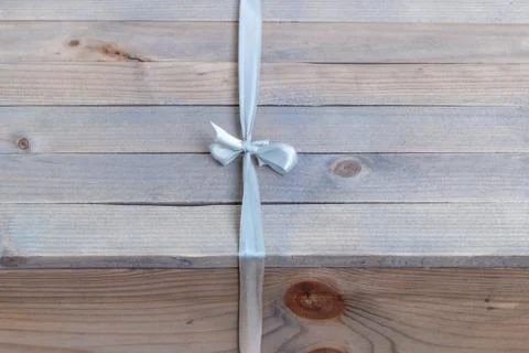 Gift box on wood table Stock Photos