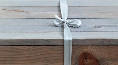 Gift box on wood table Stock Photos