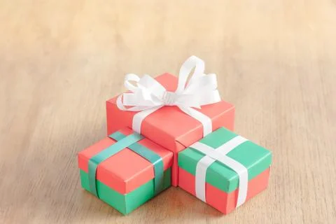 Gift box on wood table Stock Photos