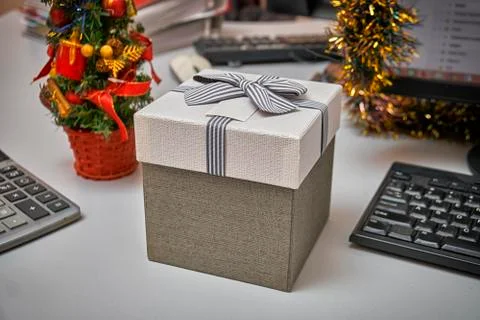Gift box on the working table 写真素材