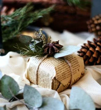 Gift box wrapped in newspaper Stock Photos