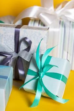 Gift box on yellow background Foto stock