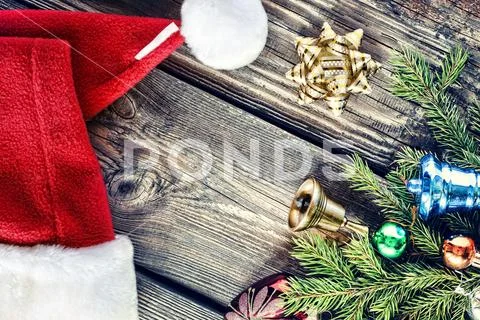 Gift boxes and Christmas ornaments on wood background, border design, Handmad Stock Photos