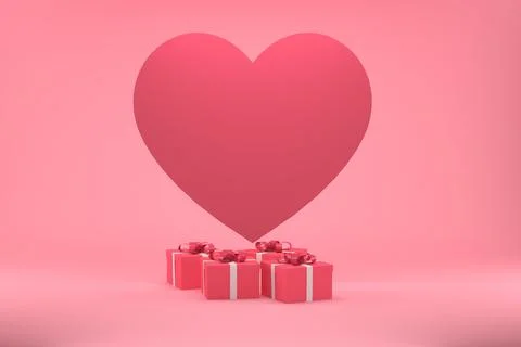 Gift boxes and an oversized red heart on a pastel pink background for valentines Foto stock