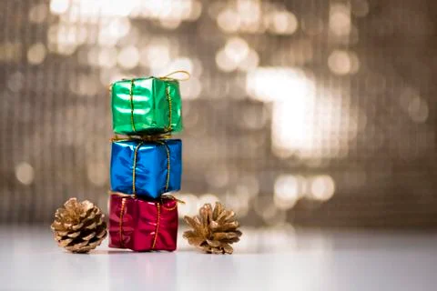 Gift boxes and pine cones Stock Photos