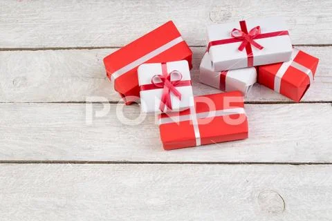 Gift boxes and present for christmas on wood table. Top view with copy space. Stock Photos