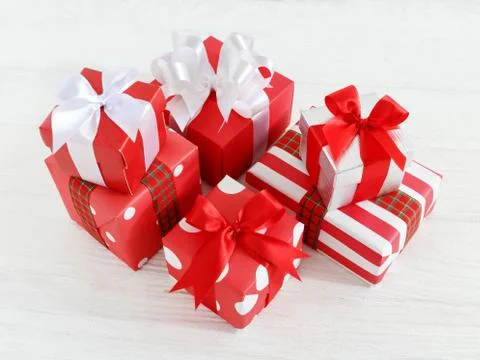 Gift boxes and present on white wooden table Stock Photos