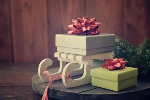 Gift boxes and sled Stock Photos