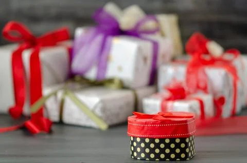 Gift boxes are on the black background. Stock Photos