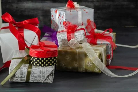 Gift boxes are on the black background. Stock Photos