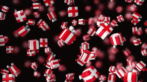 Gift boxes are falling on a black background with depth of field. Bright red  Stock Photos