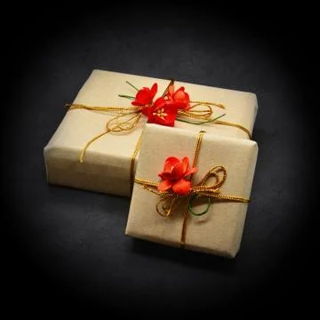 Gift boxes on a black background Stock Photos