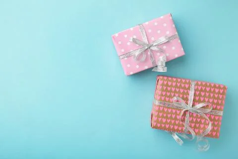 Gift boxes on blue background. Valentine's Day, Happy Women's Day, Mother's D Stock Photos