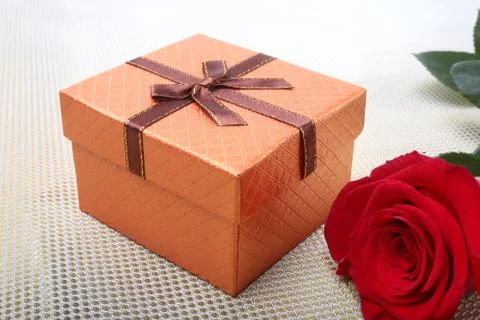 Gift boxes with bow and rose on white background. Decoration for Valentines day. Stock Photos