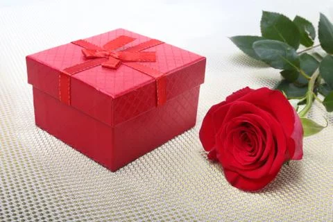 Gift boxes with bow and rose on white background. Decoration for Valentines day. Stock Photos
