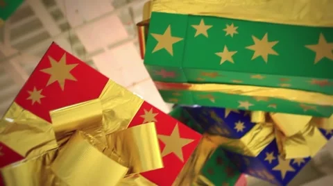 Gift boxes with bows hung from the ceiling. Decorated in shopping center Stock Footage 52976114