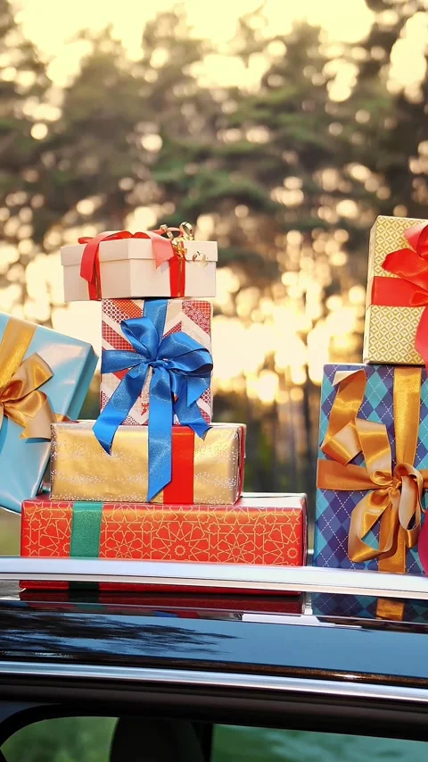 Gift boxes in car. delivery. donation, charity. many beautifully wrapped parcels 스톡 동영상 318807806