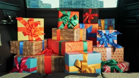 Gift boxes in the car. delivery service. many beautifully wrapped parcels, boxes 스톡 동영상 160914109