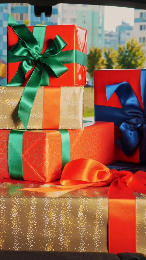 Gift boxes in the car. delivery service. many beautifully wrapped parcels, boxes 스톡 동영상 319100731