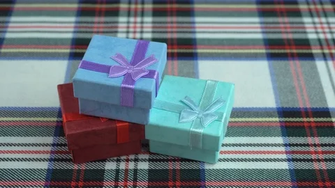 Gift boxes on a checkered background Stock Footage 102912840