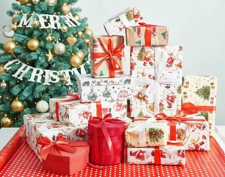 Gift boxes christmas tree background. Luxury New Year gift. Merry Christmas b Stock Photos
