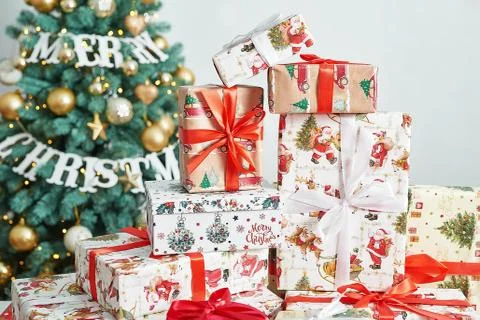 Gift boxes christmas tree background. Luxury New Year gift. Merry Christmas b Stock Photos