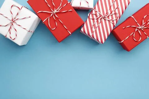 Gift boxes on color background, flat lay, space for text Stock Photos