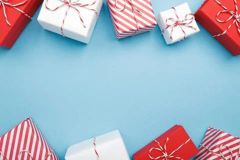 Gift boxes on color background, flat lay, space for text Stock Photos