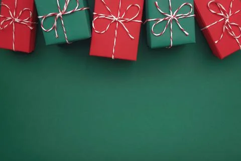 Gift boxes on color background, flat lay, space for text Stock Photos