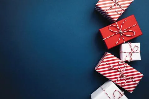 Gift boxes on color background, flat lay, space for text Stock Photos